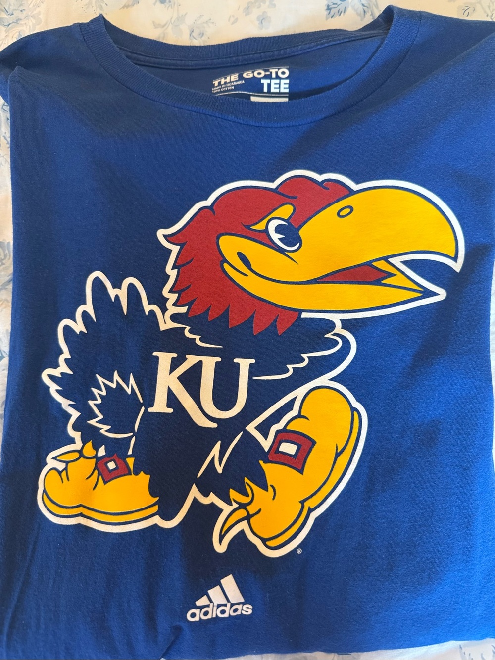 Adidas Blue KU Jayhawk Graphic Tee with Yellow & Red Accents